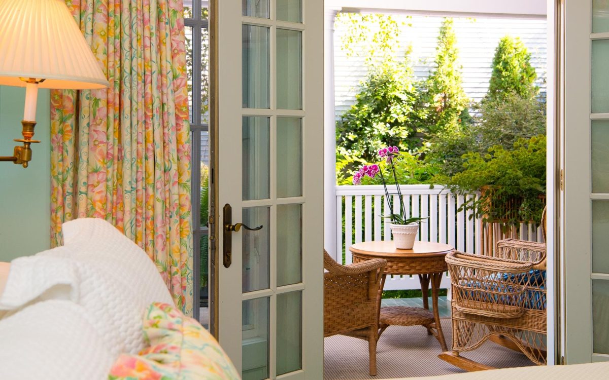A view of the outside patio with seating from the inside.