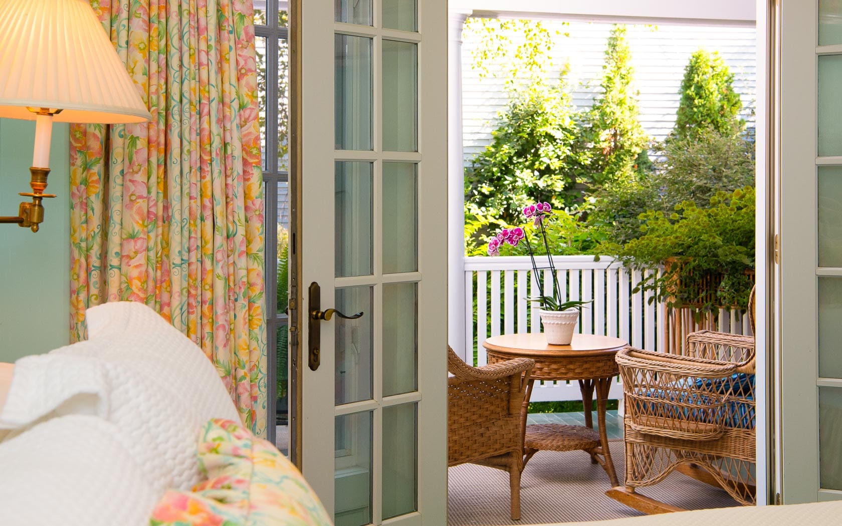 A view of the outside patio with seating from the inside.